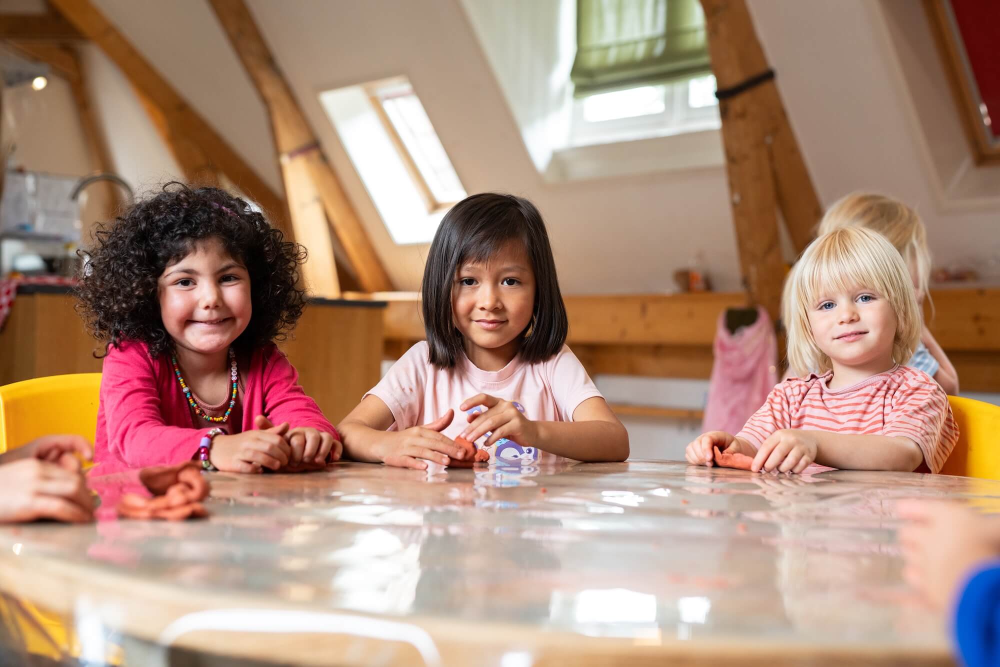 Girls doing an activity at the table