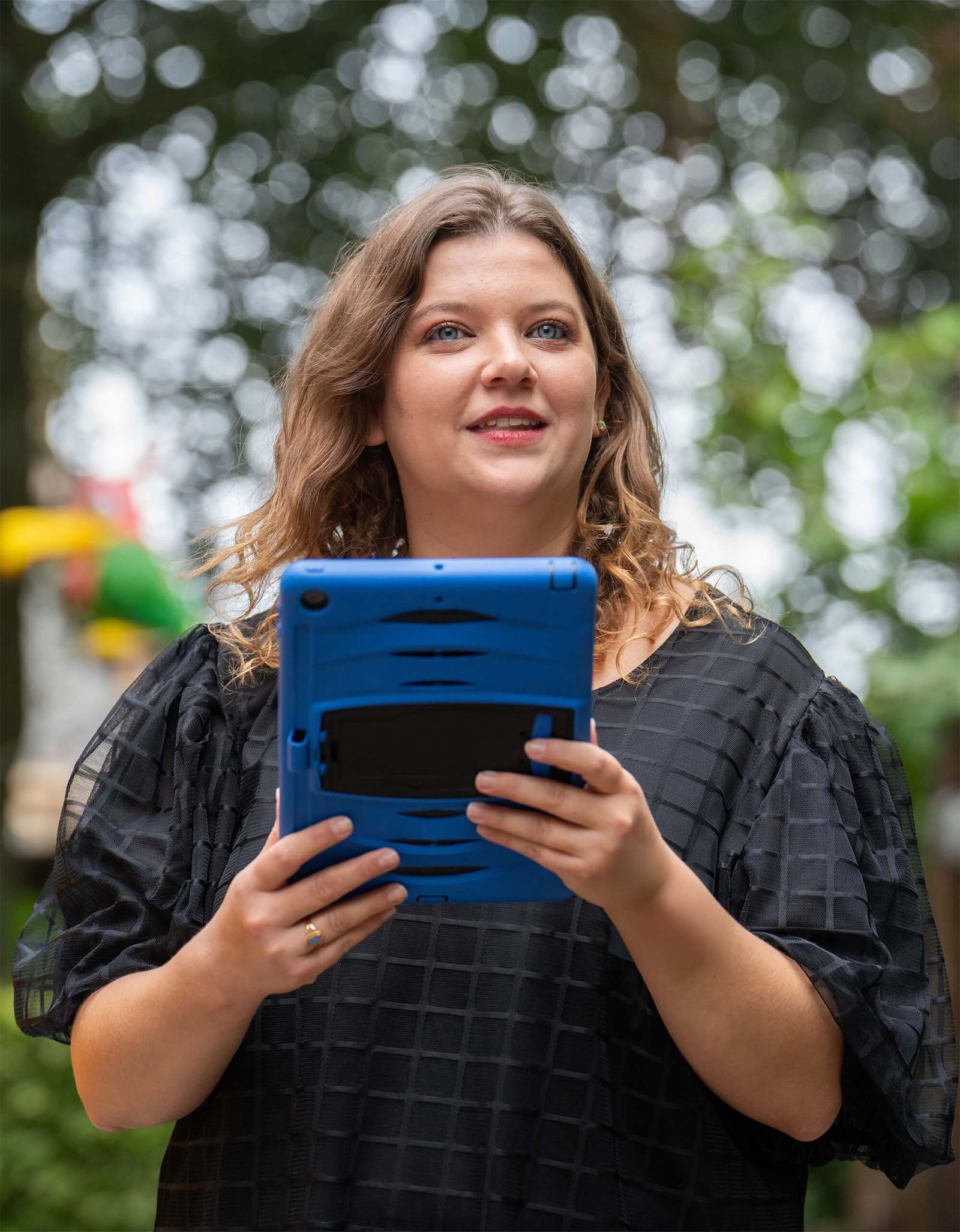 Teacher holding an Ipad