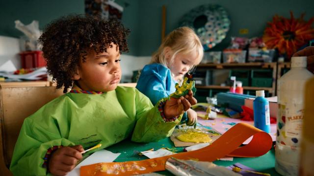 Children painting at Basker International Childcare