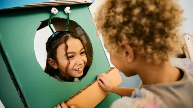 Girls playing with a space ship at Basker International Childcare