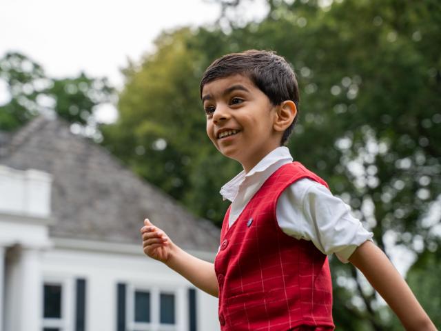 Happy child at Basker Childcare 