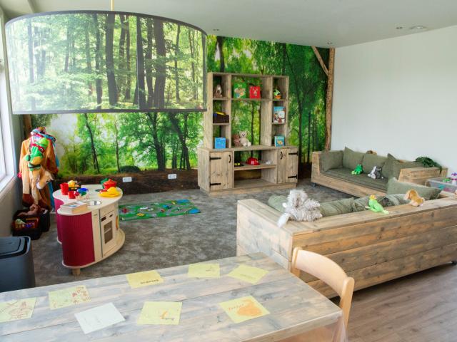 Room with couches and play area