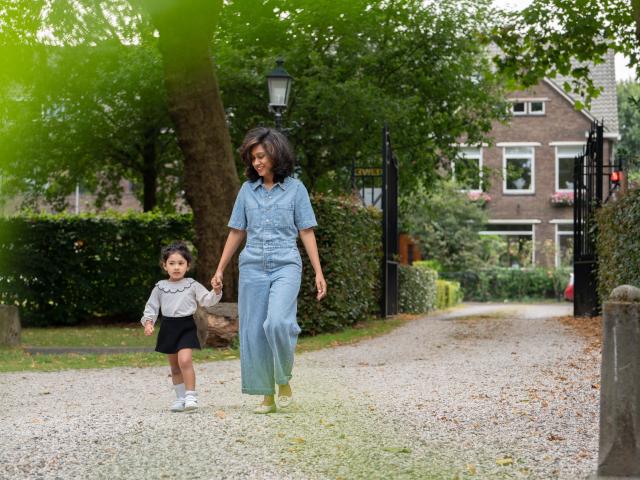 Teacher and Child Walking