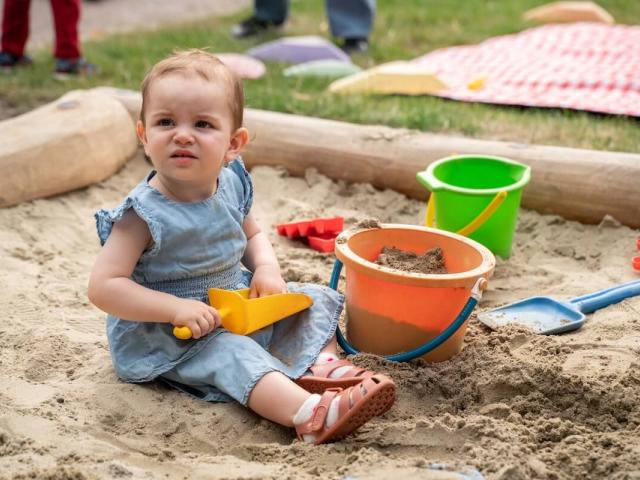 Girl playing with sand
