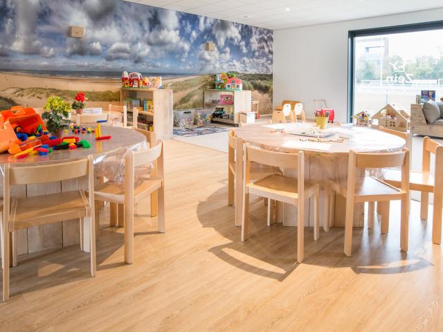 Tables and chairs and playcorner