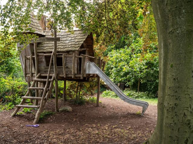 Outdoor play area in a green scenery