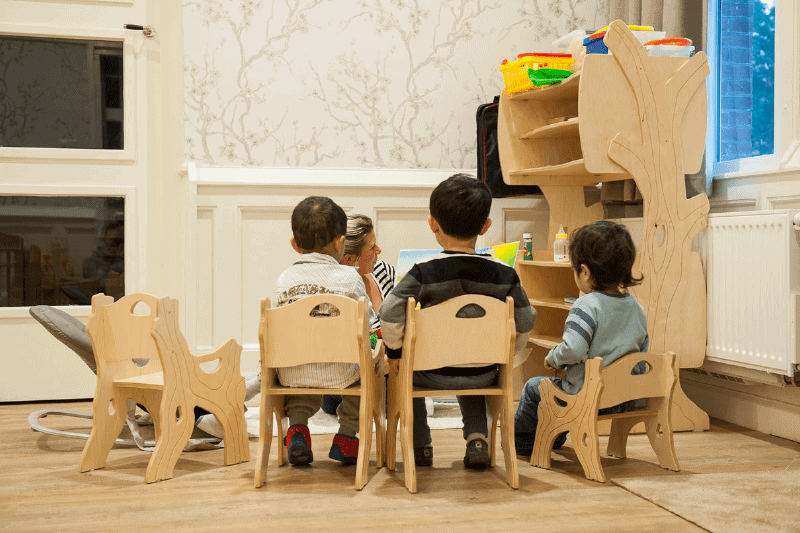 Children in a Circle on a Chair