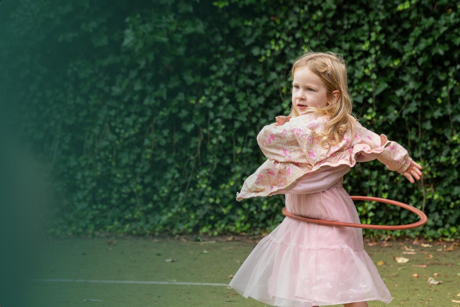 Girl hooping at Basker International Childcare After School Care