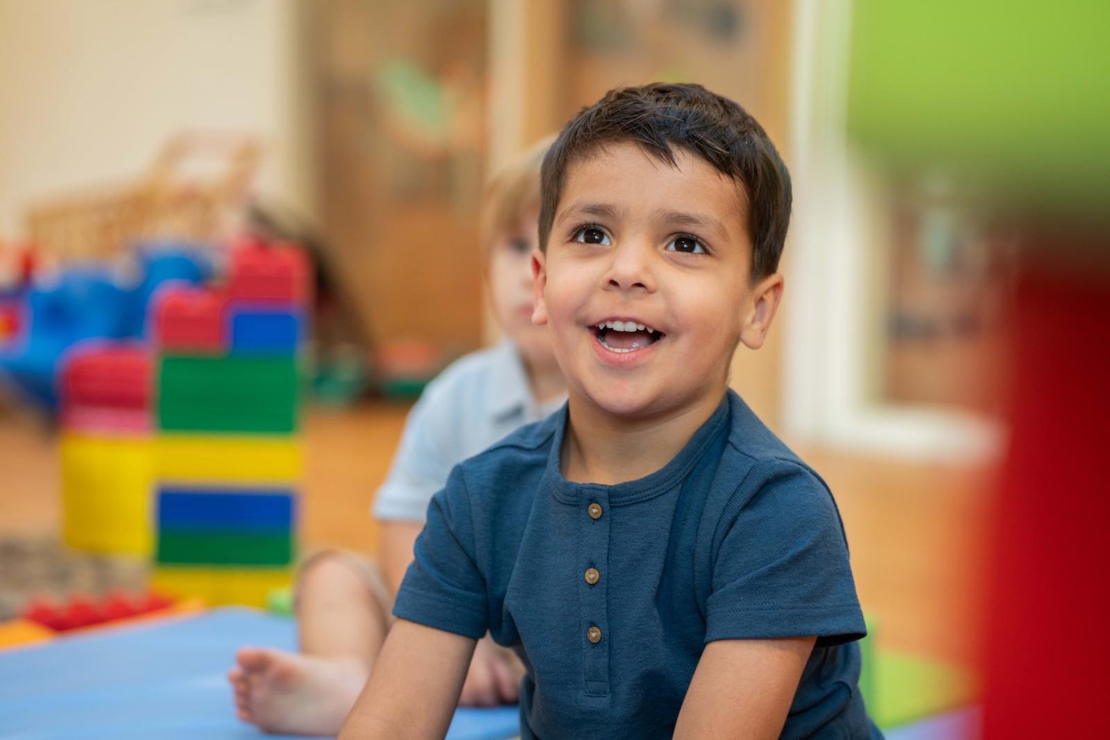 Boy in play room at Basker International Childcare