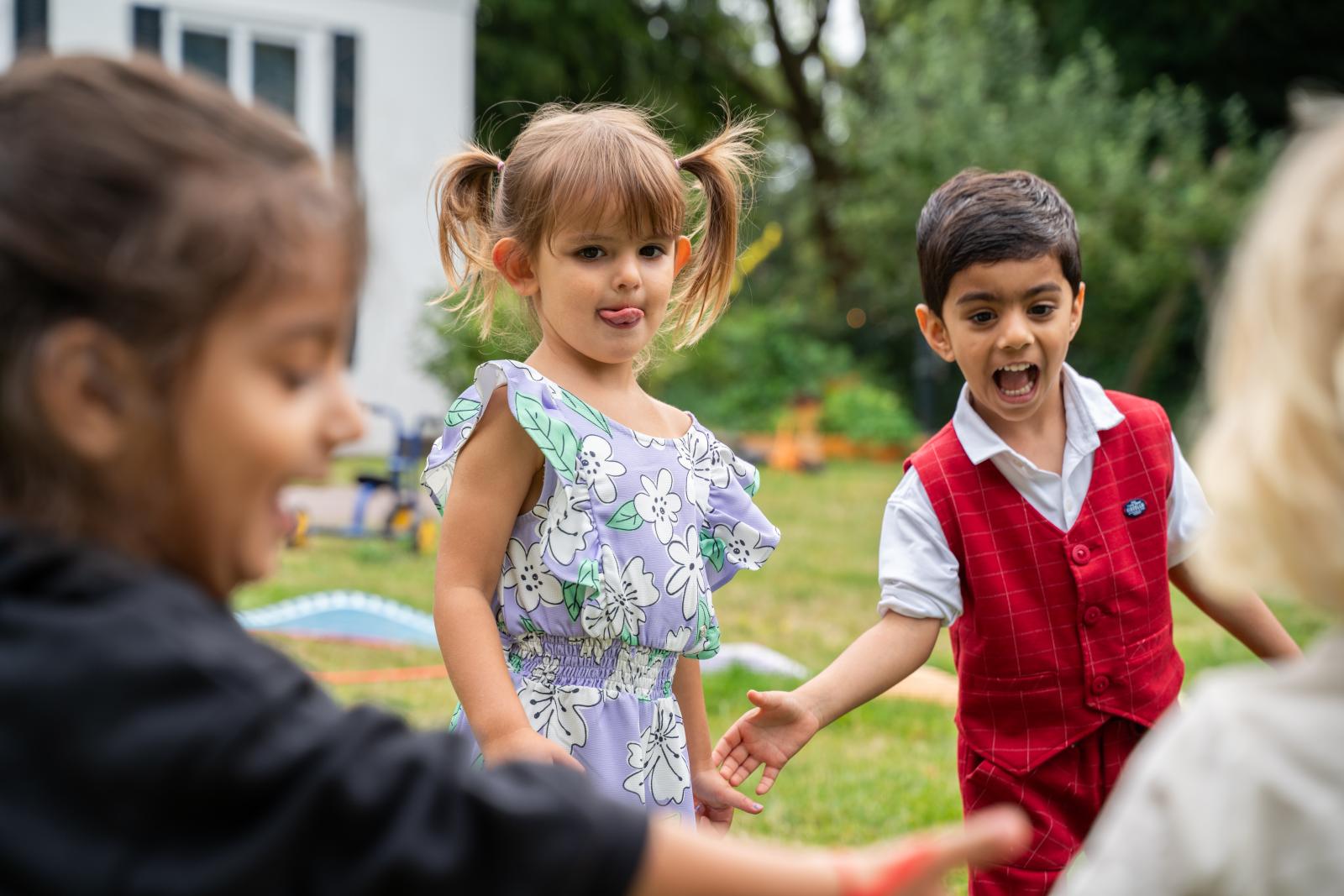 Children playing together in a circle
