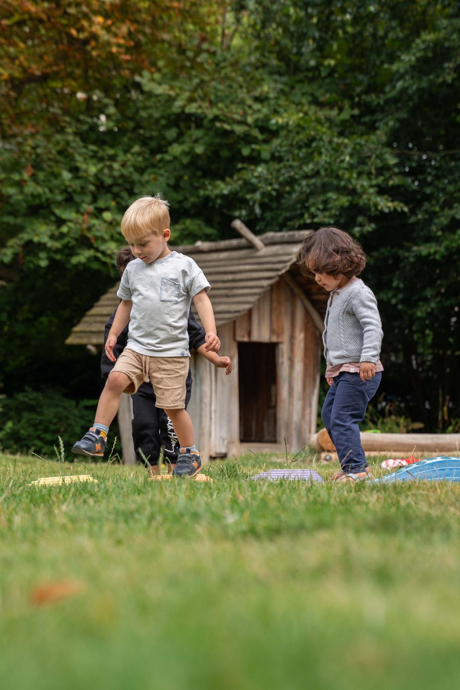 Children playing outside at Basker International Childcare