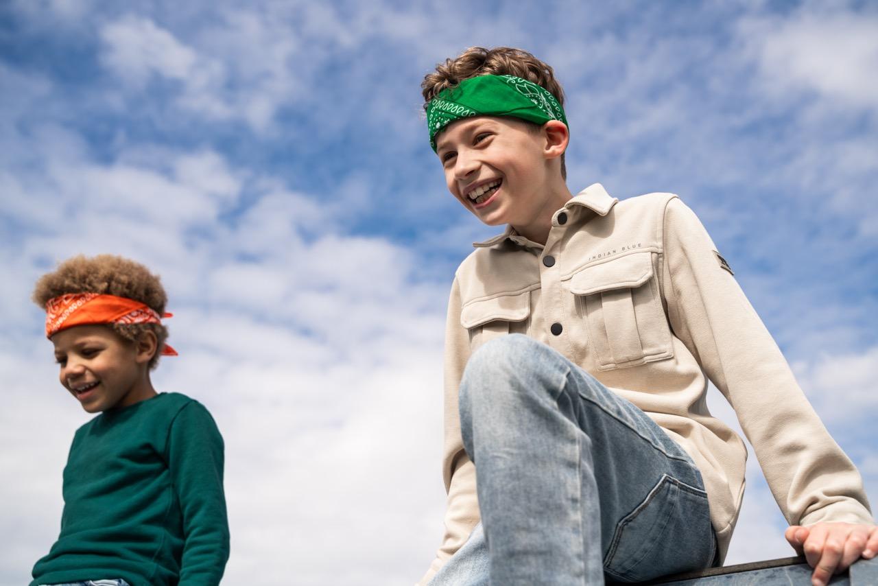 Two kids playing outdoors at Club Basker International